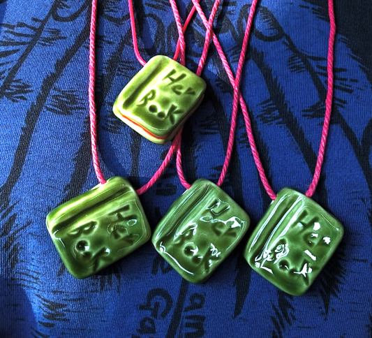 51 Personae: Her Book ceramic necklace